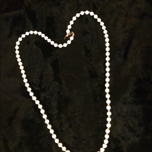 White and gold beaded necklace